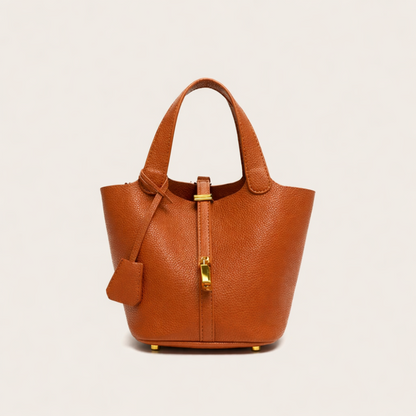 Cala - Bolsa Bucket Suave con Herraje Dorado.